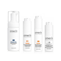 Four white Amerín skincare bottles from the Advanced Treatment line, including Essential Foaming Cleanser, Prime Serum, Prime Cream, and Correct Night Eye Cream, arranged on a white background.